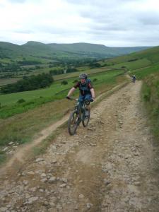 Alistair climbing out of Edale Valley.